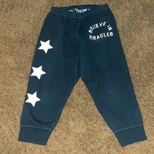 Spiritual Gangster Dark Green Joggers with Star Details - cropped